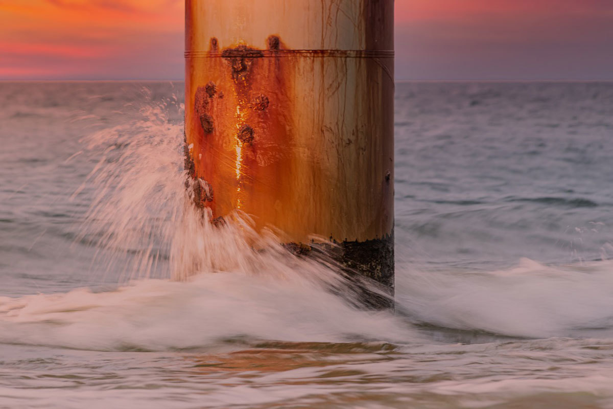 Rusty metal pier ocean