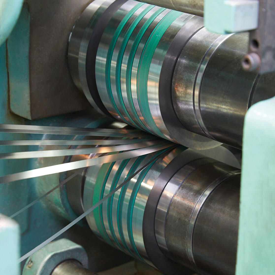 Sheet Metal Strips Exiting The Slitting Line Stock Photo - Download Image  Now - Steel, Curled Up, Cutting - iStock